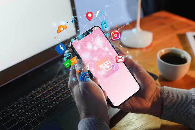 Panduan Lengkap Strategi Pemasaran Media Sosial untuk Restoran Anda 2 hands holding smartphone social media concept 23 2150208239 - Panduan Lengkap Strategi Pemasaran Media Sosial untuk Restoran Anda - 1